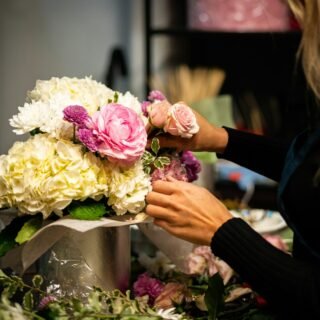 Arranging flowers in a vase