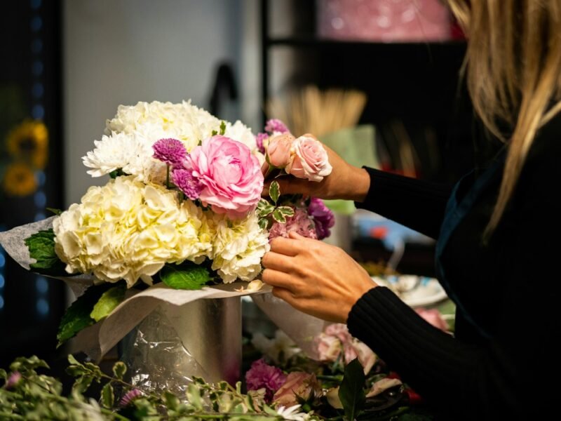Arranging flowers in a vase