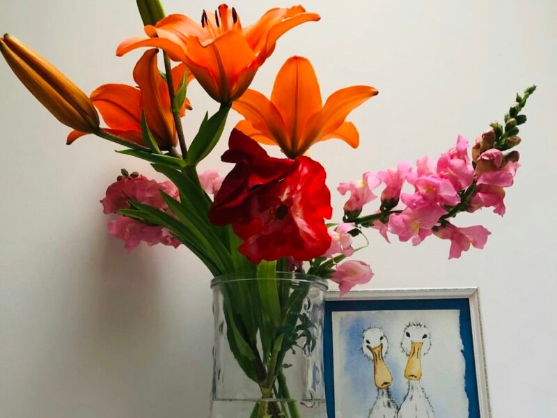 Ikebana-style arrangement in a ceramic vase