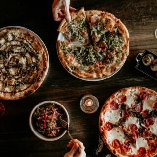 Making pizzas in a pizzeria