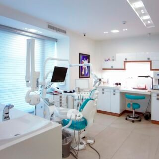 Modern dental surgery with chair and equipment
