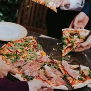 Pizza with cheese and fresh basil