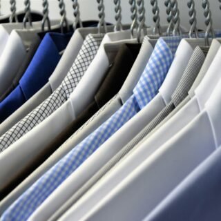 Pressed dress shirts on hangers
